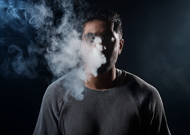 Smoke around man's head